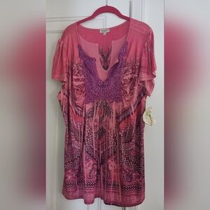 Brand new women plus size short sleeve shirt. New tag has been took off.